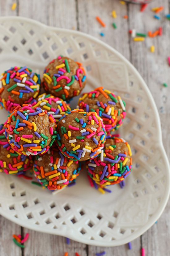 no-bake protein balls on white plate sprinkles fountainof30