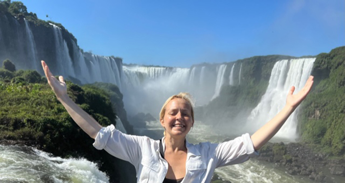 Jacqueline Zenn in Igazú Chile with waterfalls fountainof30