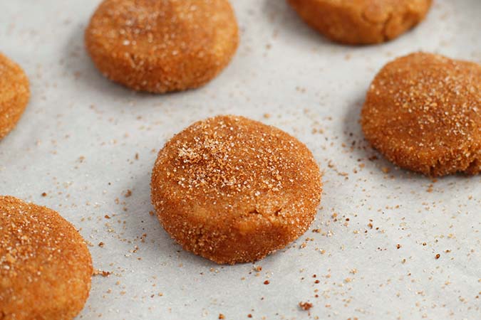 flattened dough balls on cookie sheet fountainof30