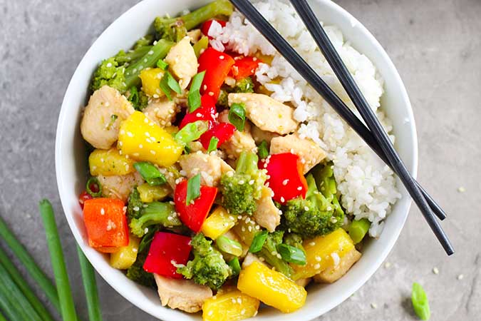 pineapple chicken serving over rice fountainof30