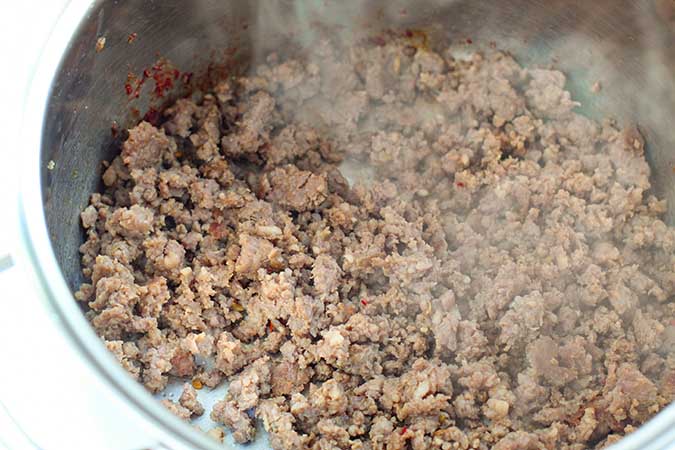 brown italian sausage in pan fountainof30