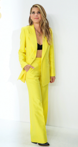 Marisa Tomei in yello Gabriela Hearst pants suit