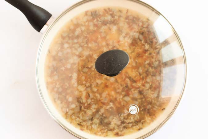 lid on saucepan with wild rice and broth fountainof30