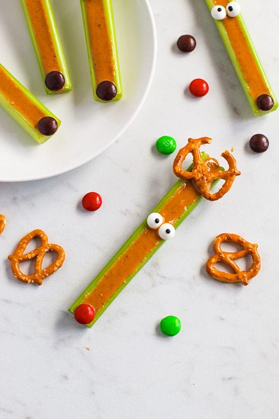 mutiple reindeer celery sticks with peanut butter m&ms fountainof30