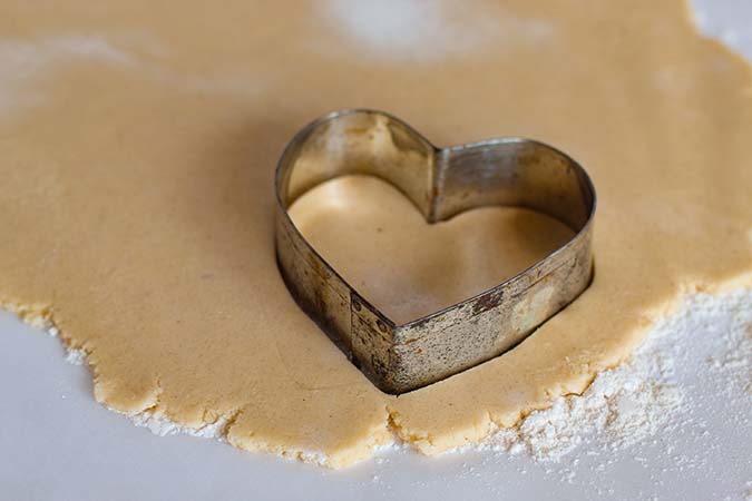 rolled dough with heart cookie cutter fountainof30