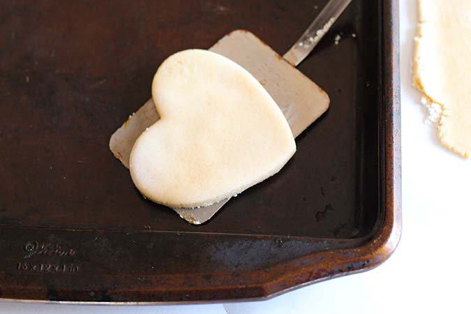 heart shaped sugar cookie on spatula fountainof30