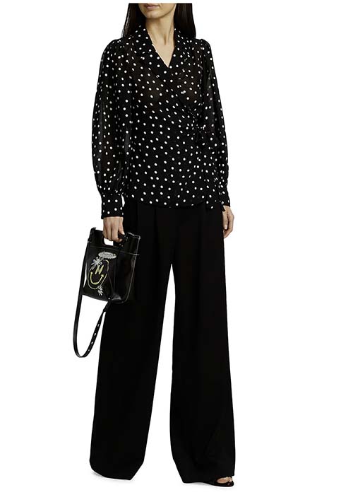 ganni polka dot blouse and black pants