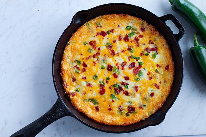 baked Jalapeno Popper Dip in skillet fountainof30