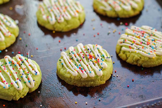 iced lucky lime cookies on cookie sheet fountainof30