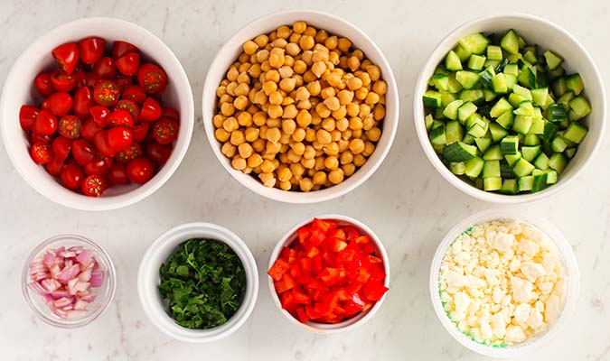 Mediterranean Chickpea Salad 7 ingredients in bowls fountainof30