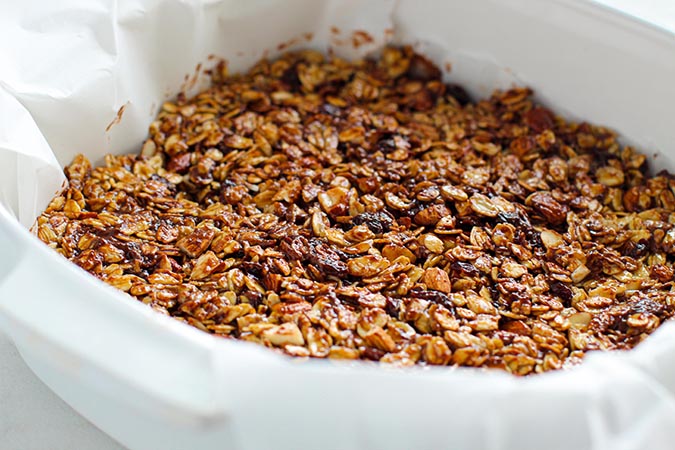 Transfer the granola to parchment prepared pan fountainif30