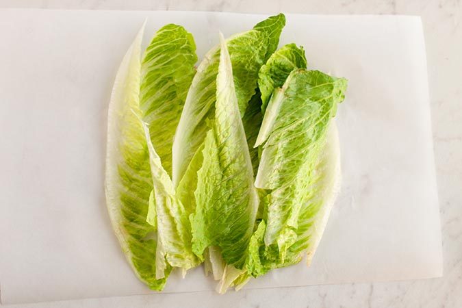 overlap and arrange leaves on parchment paper