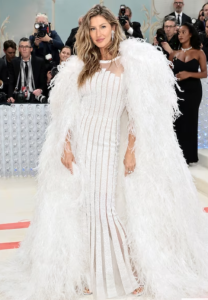 Gisele Bundchen in white feather vintage Chanel 2007