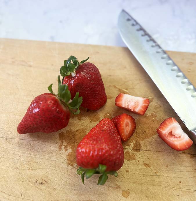 chopping strawberries fountainof30