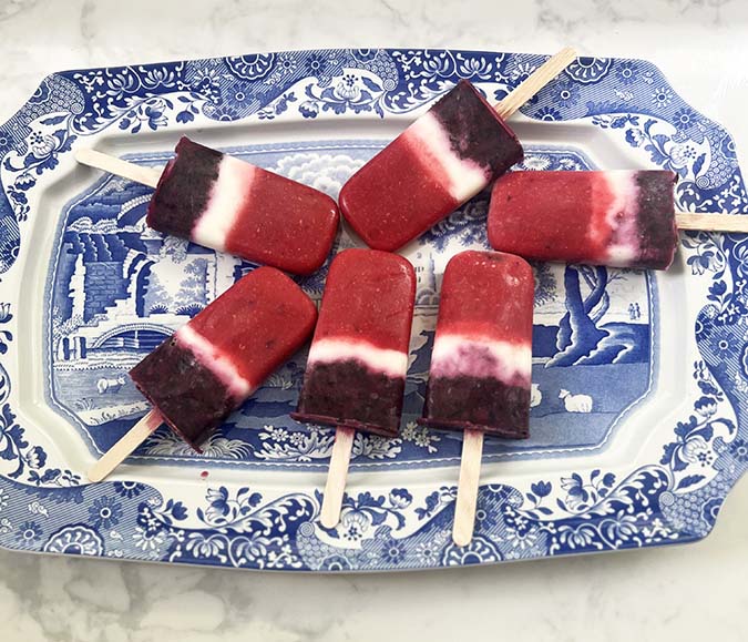  Red White And Blue Frozen Popsicles on a blue and white plate fountainof30
