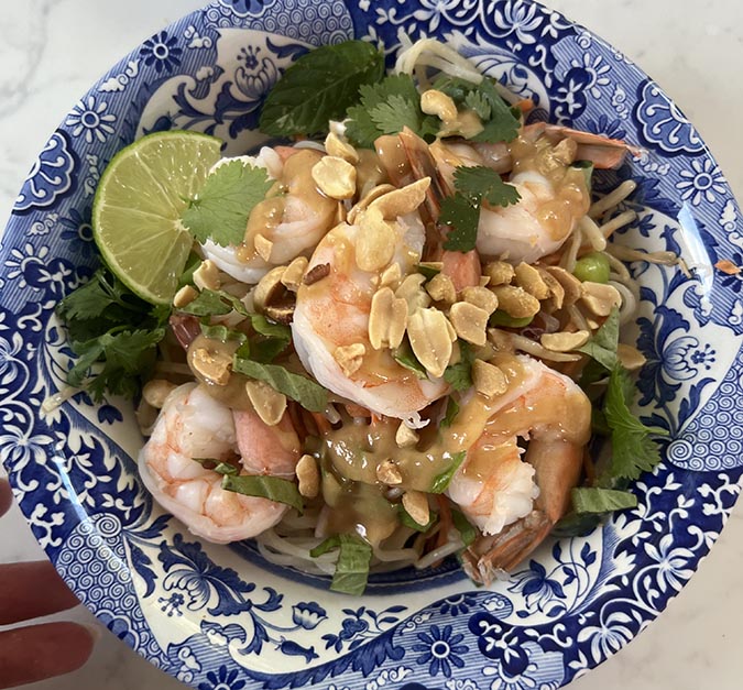 peanut topped shrimp summer roll in a bowl fountainof30