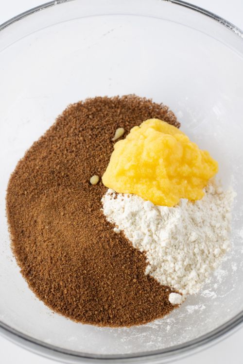 flour, baking powder, baking soda, salt, cinnamon, and lemon zest.