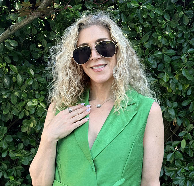Lauren wearing her naturally air-dried curly hair in Summer 2026.