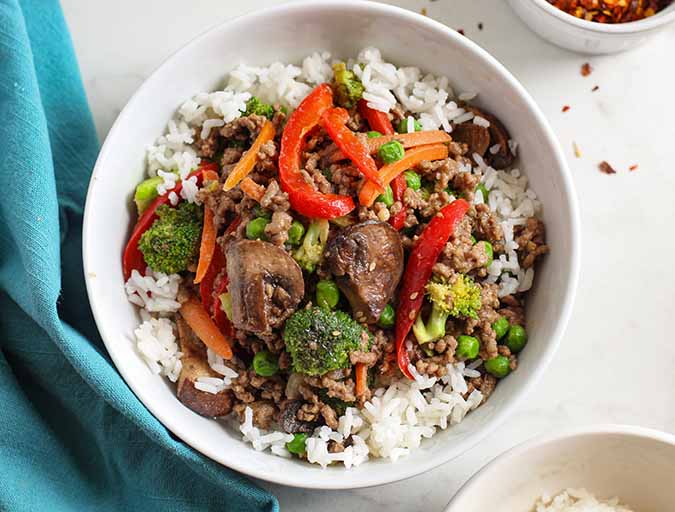 stir fry over cooked white rice