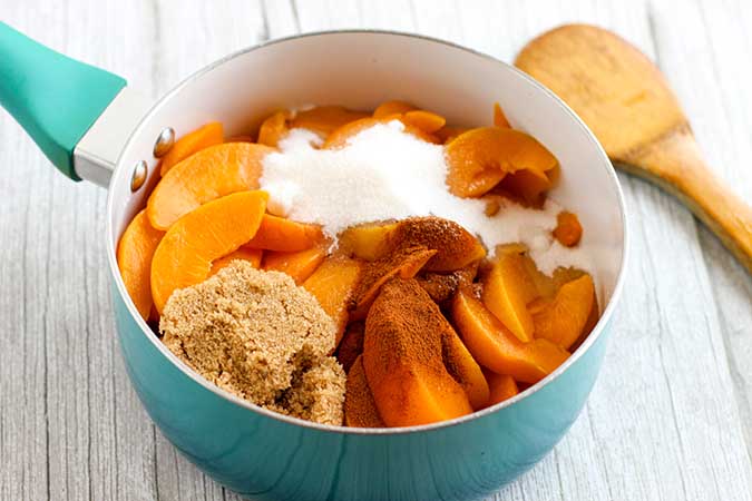 peaches and Ingredients in saucepan to cook the filling