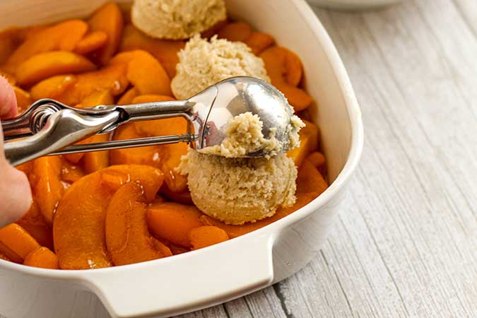 spoonfuls of doug over the peach filling