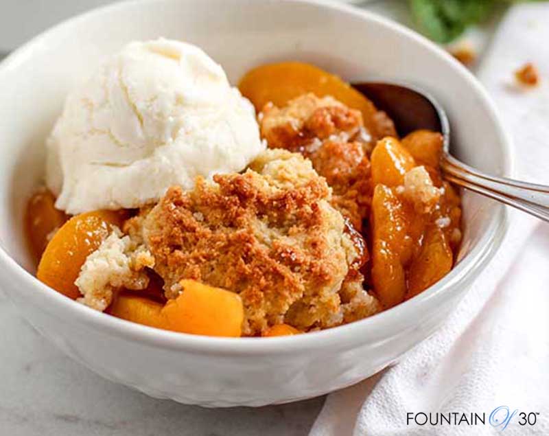 rustic peach cobbler with ice cream fountainof30