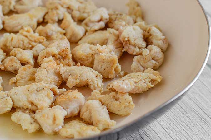 golden brown chicken breast in skillet fountainof30