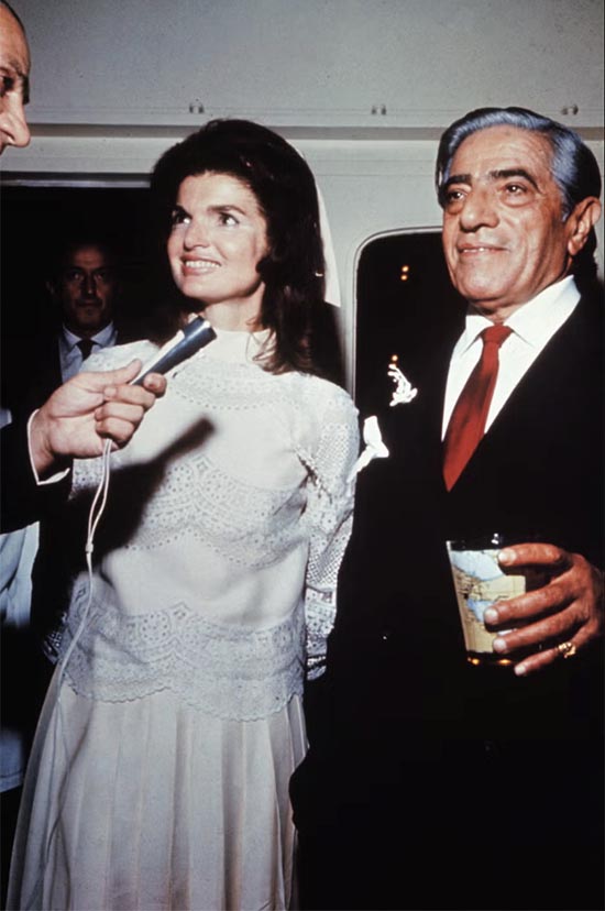 Jacqueline Kennedy Onassis in Valentino weddng dress and Aristotle Onassis in 1968, GETTY Photo