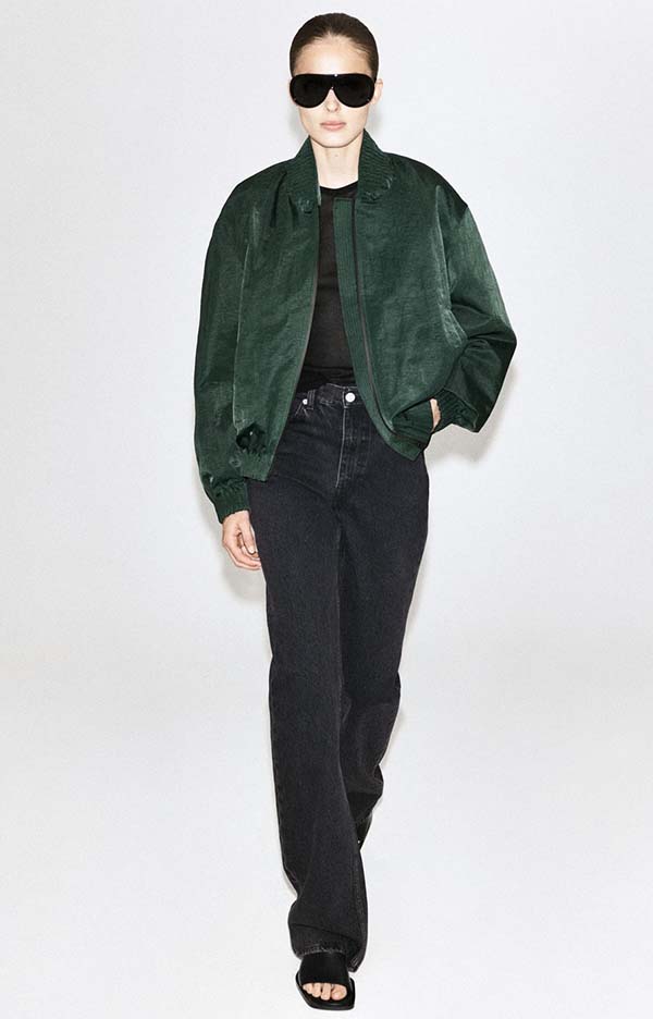 Dark green gathered nylon bomber jacket for fall with black straight jeans