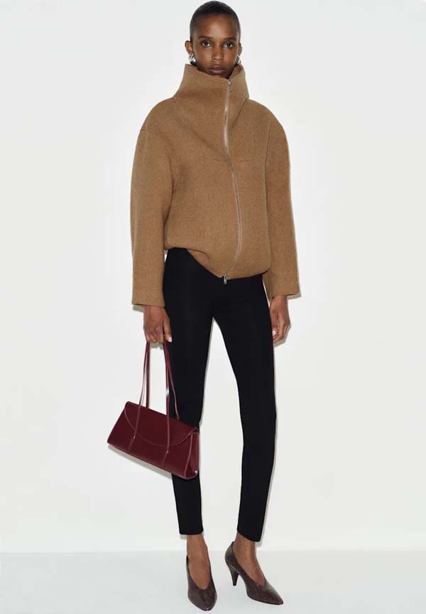 Wool-blend bomber jacket styled with black skinny pants